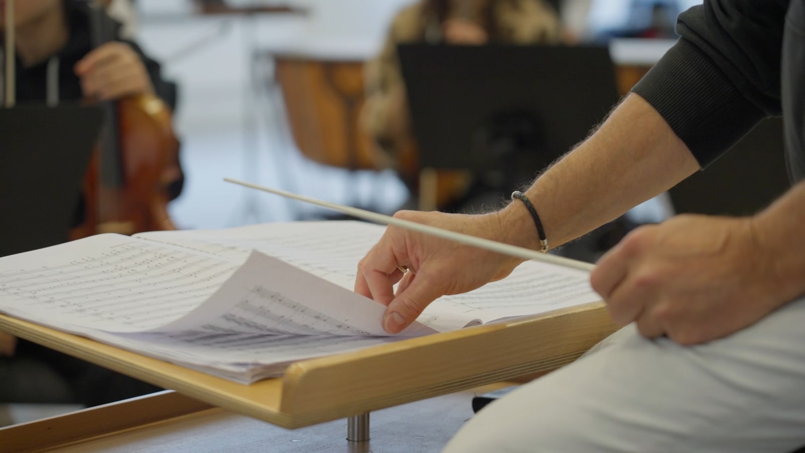 Detail of sheet music and bow during a Beethoven Meets Jazz rehearsal.